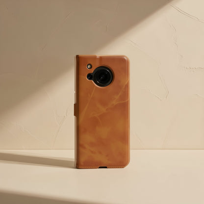 Softshell – Calf pattern flip case in tan, standing upright with side magnetic tab and camera cutout on cream backdrop