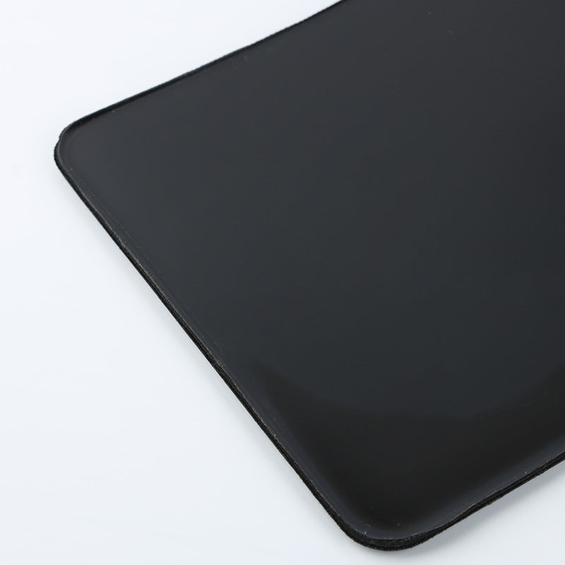 Restfoam Memory Foam Wrist Rest Pad – close-up of a black wrist rest pad corner showing smooth surface and rounded edge