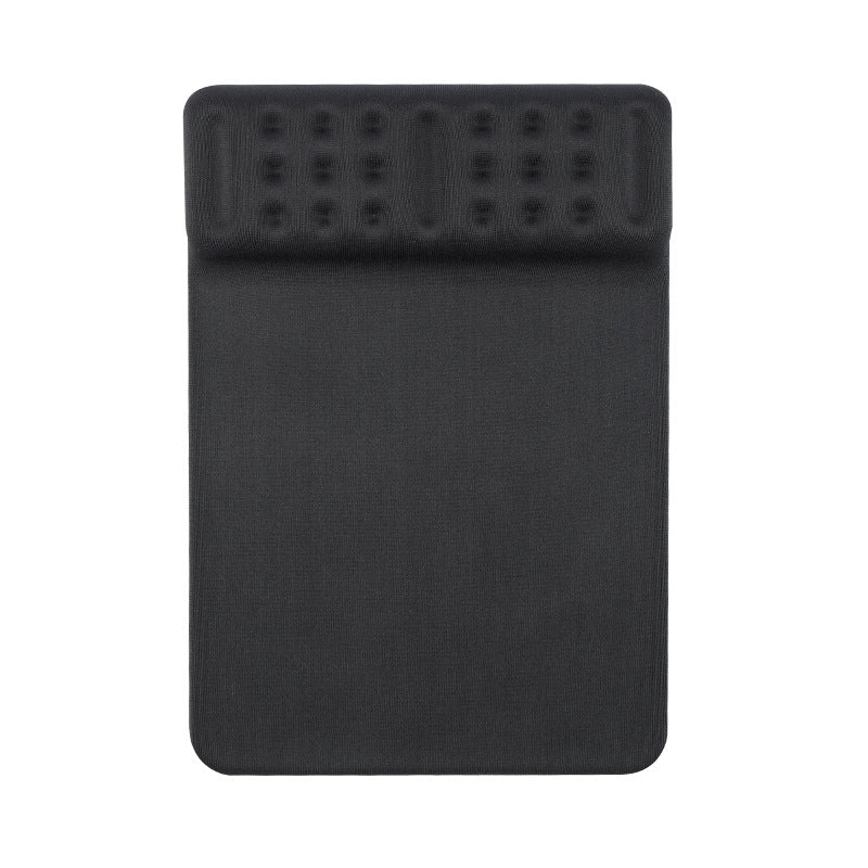 Restfoam – Top-down view of a black wrist rest pad with a raised dotted foam strip along the top edge