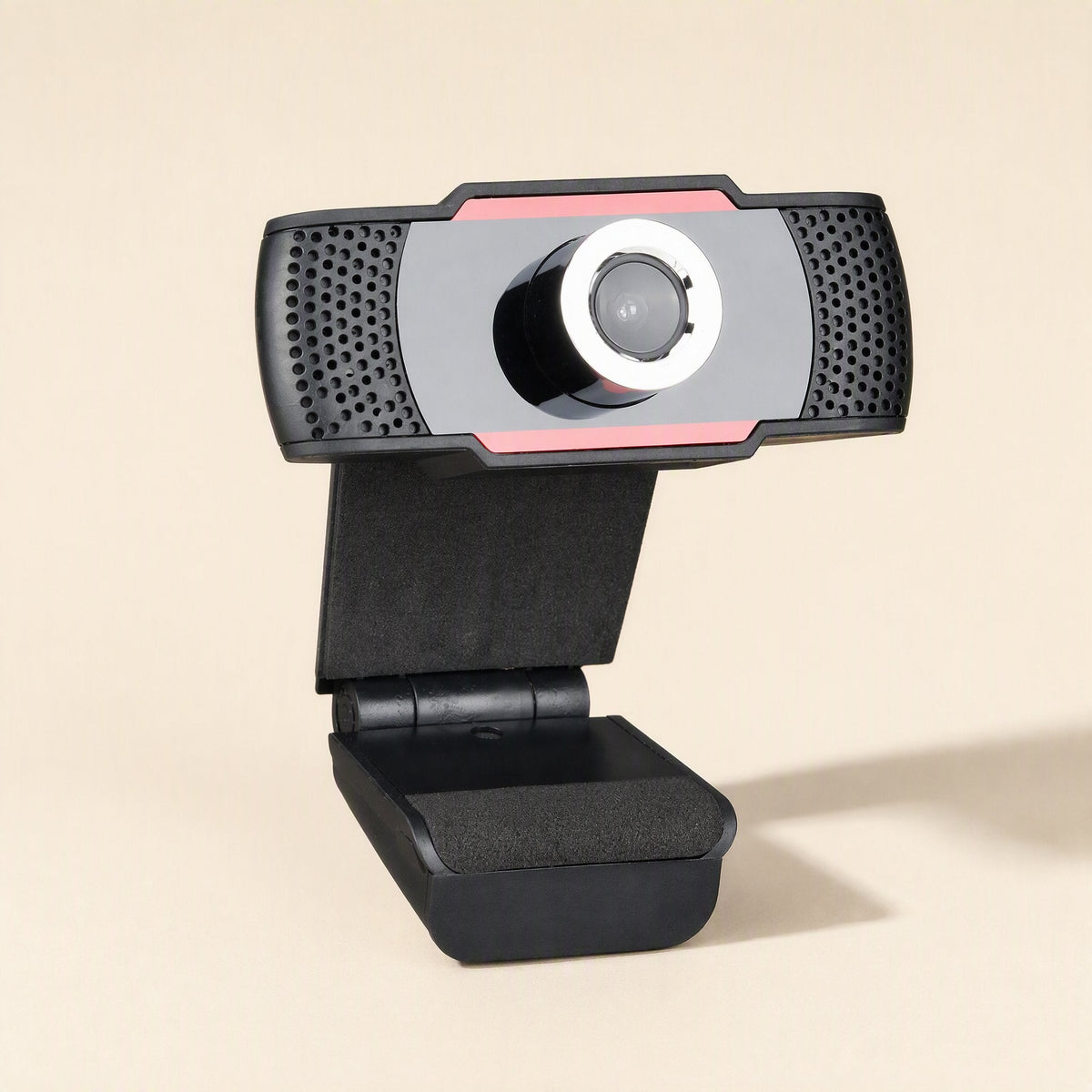 Sharpview – Black webcam with pink accent trim and silver lens ring, shown from a three-quarter angle with clip stand