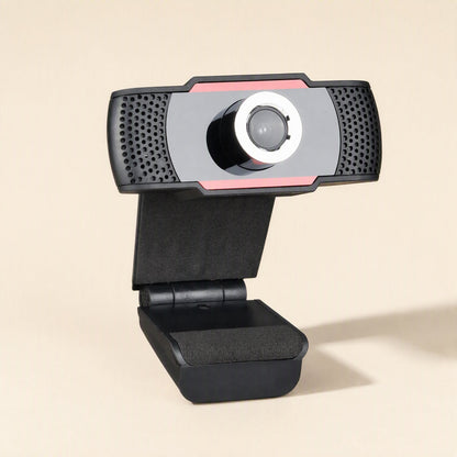 Sharpview – Black webcam with pink accent trim and silver lens ring, shown from a three-quarter angle with clip stand