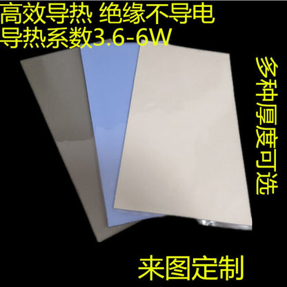 Dewflex – Three thermal pad sheets in gray, blue and cream side by side on a dark background, with Chinese text