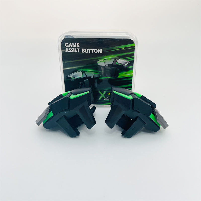 Burstgrip – Pair of black and green trigger controllers in front of a boxed retail package labeled Game Assist Button