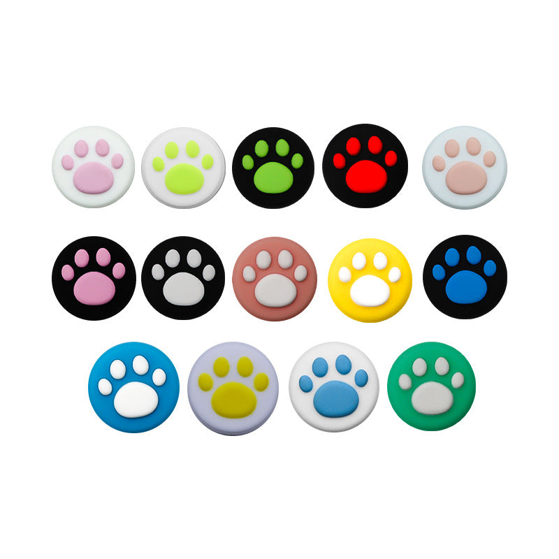 Clawbit – Fourteen cat paw joystick caps in a grid, showing pink, green, red, yellow, blue and other colour combinations