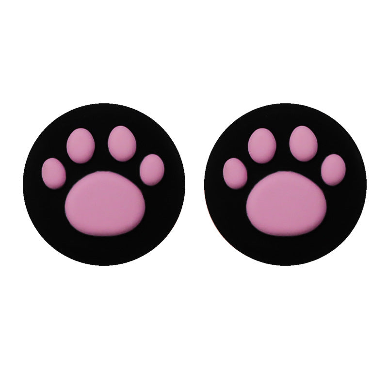 Clawbit – Pair of black joystick caps with pink cat paw pads, shown side by side on a white background