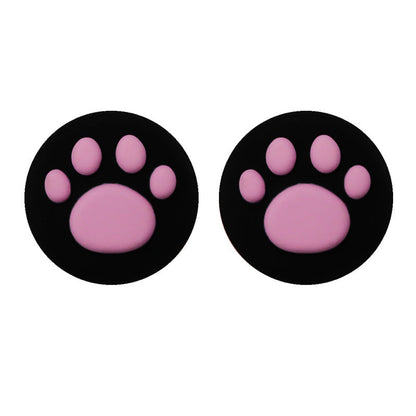 Clawbit – Pair of black joystick caps with pink cat paw pads, shown side by side on a white background