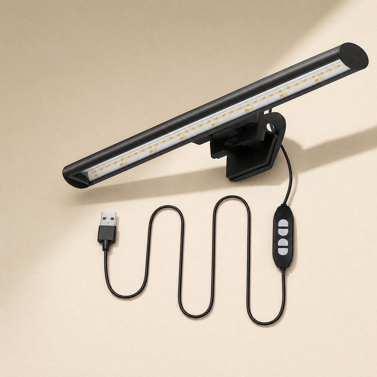 Deskbeam – Black screen lamp bar glowing warm light, with clip mount and USB cable with touch control buttons