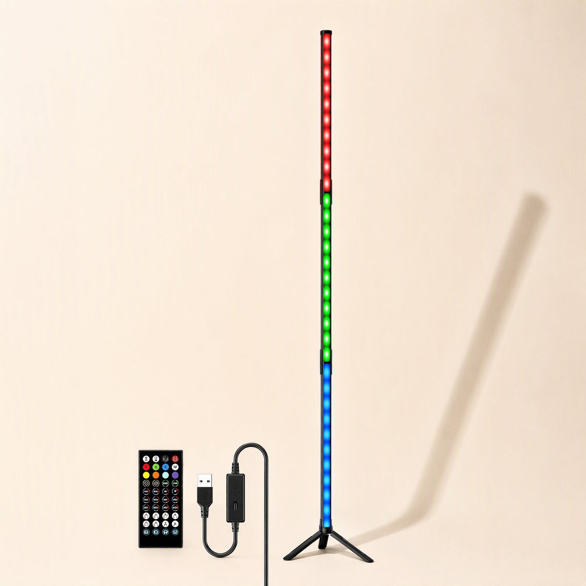 Deskbeam – Tall RGB LED floor light on a tripod base, red, green and blue sections, with remote and USB cable