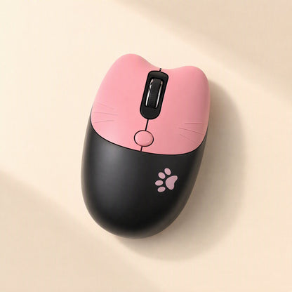 Triclick – Pink and black cat-ear wireless mouse with whisker details and a pink paw print, seen from above
