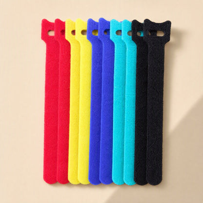 Softbind – Ten hook-and-loop cable ties in pairs of red, yellow, blue, turquoise and black, laid side by side