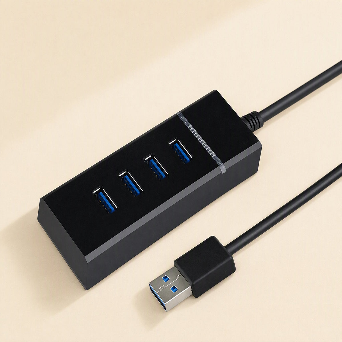 Databranch – Black four-port USB hub with coiled cable and blue-lined ports, viewed from the plug end