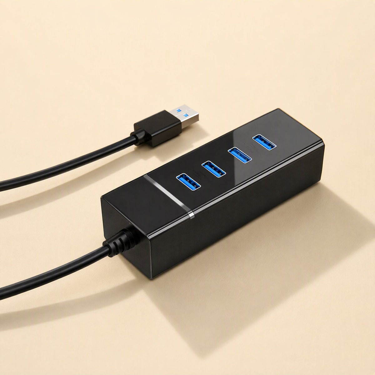 Databranch – Black USB hub seen from the cable side, four blue ports in a row and a silver accent line