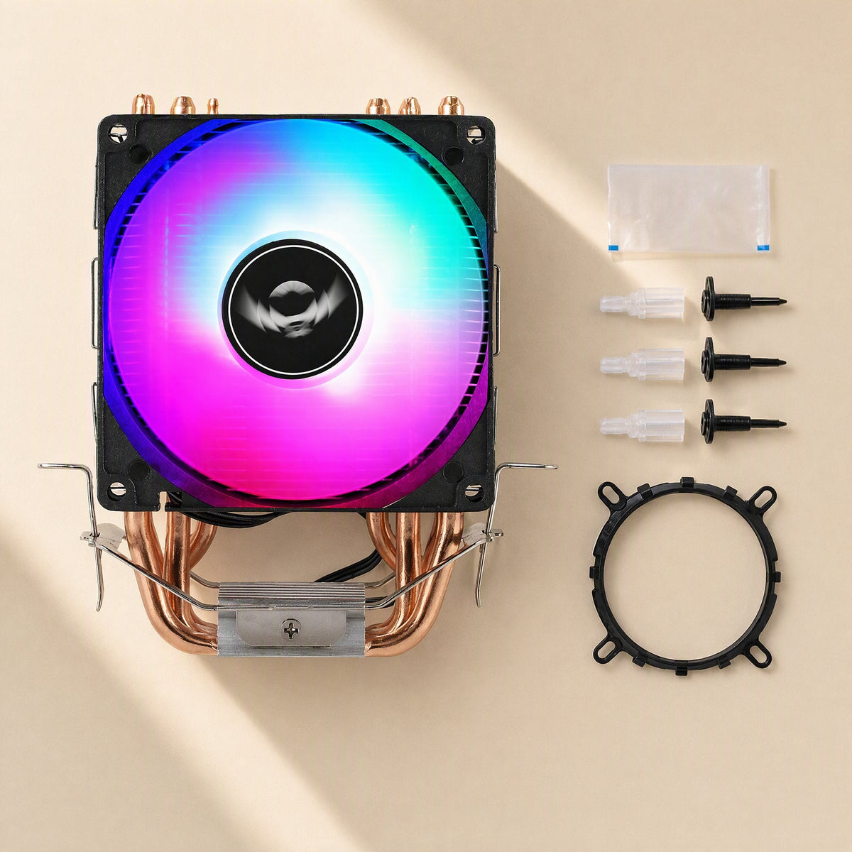 Copperchill Copper and Aluminum CPU Cooler flat lay with RGB fan, mounting screws, bracket ring and thermal paste