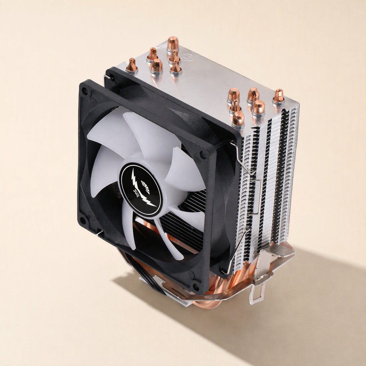 Copperchill – Top-down angled view of the cooler's white-bladed fan, aluminum fins and copper heat pipe tips