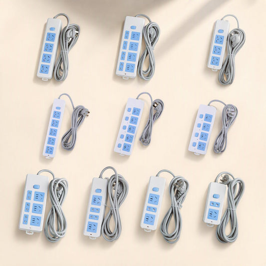 Cordcraft – Ten white and blue power strips with grey cords coiled beside them, arranged in rows on a beige surface