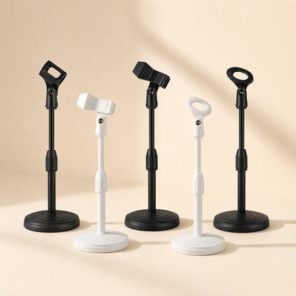 Voicelift – Row of five desktop mic stands in black and white with oval and clamp clips, shown at a closer angle