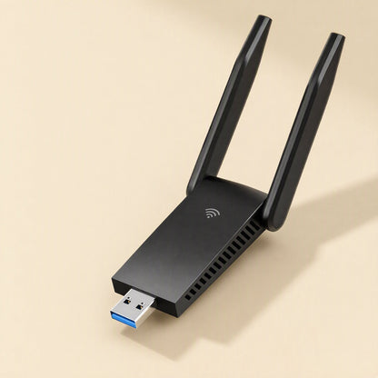 Twinsignal USB 3.0 dual-band wireless network card with two angled antennas, seen from above on beige