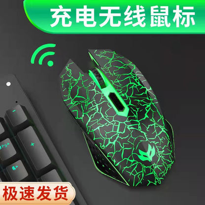 Silentrail – Black wireless mouse with glowing green crackle pattern, beside a dark keyboard and Wi-Fi signal icon