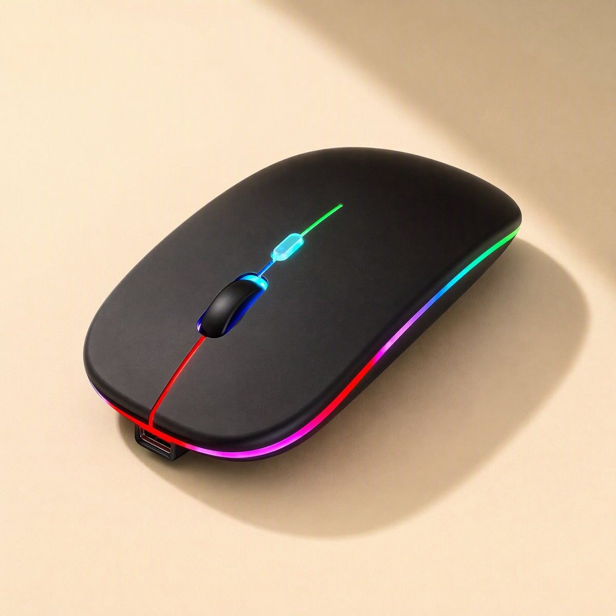 Freemove 2.4GHz Wireless Mouse in black with rainbow LED edge lighting, seen from above on a beige surface