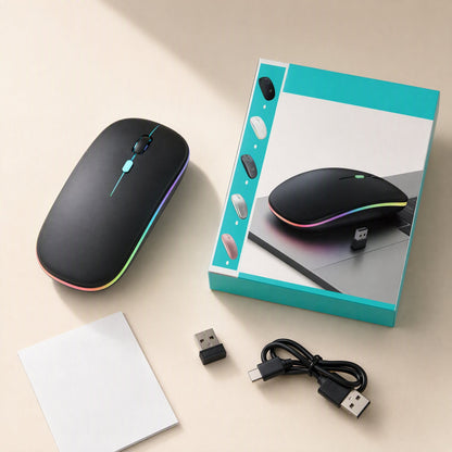 Freemove – Black LED mouse with USB receiver, charging cable, manual and teal retail box showing color options
