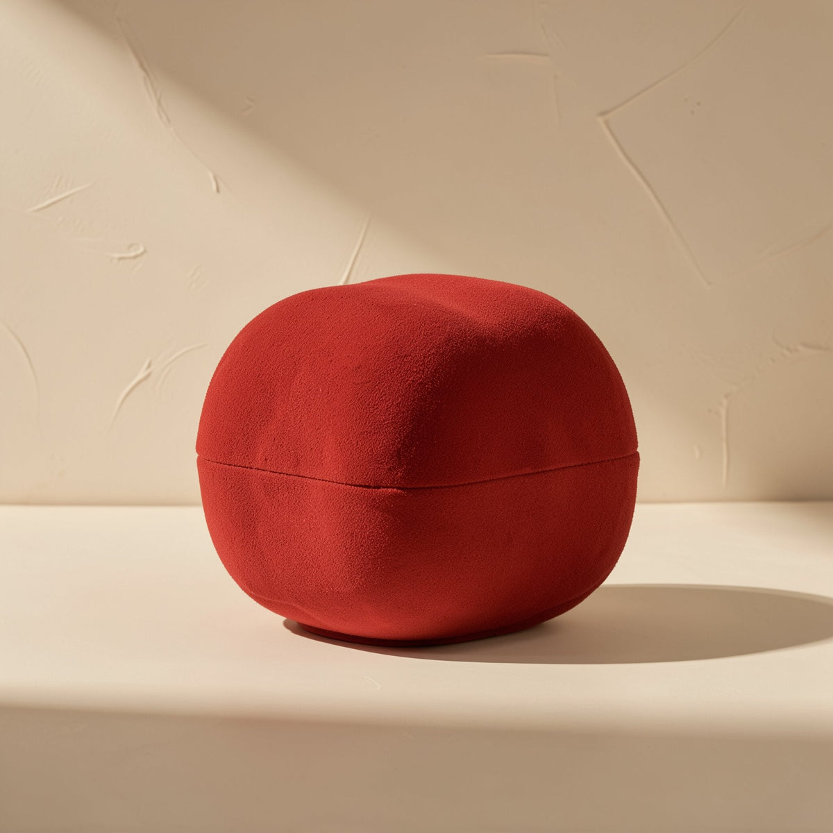 Curvehush U-Shaped Sponge Microphone Cover – red sponge cover in a rounded cube shape with a seam across the middle