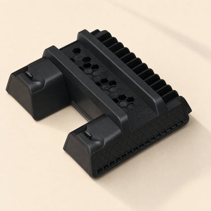 Ventstand – Top-down angled view of the black bracket showing hexagon vent pattern and two controller charging docks