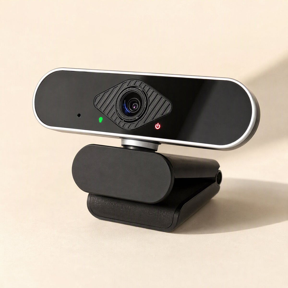 Faceview – Black and silver webcam with green indicator light and red power icon, shown from a raised left angle