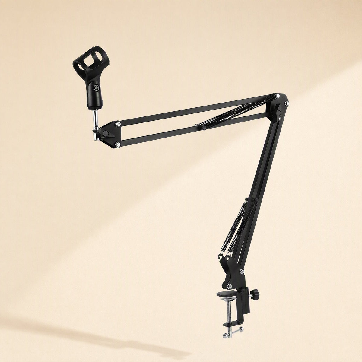 Streamreach Live Broadcast Cantilever Bracket in black, extended with a microphone clip on a beige backdrop