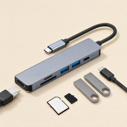 Dockarray Six-in-One USB-C Docking Station with HDMI cable, SD and microSD cards and two flash drives beside it