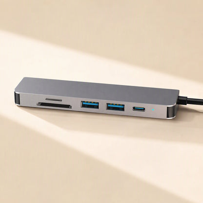 Dockarray – Front edge of the hub showing card slots, two blue USB 3.0 ports and a USB-C port with a small LED
