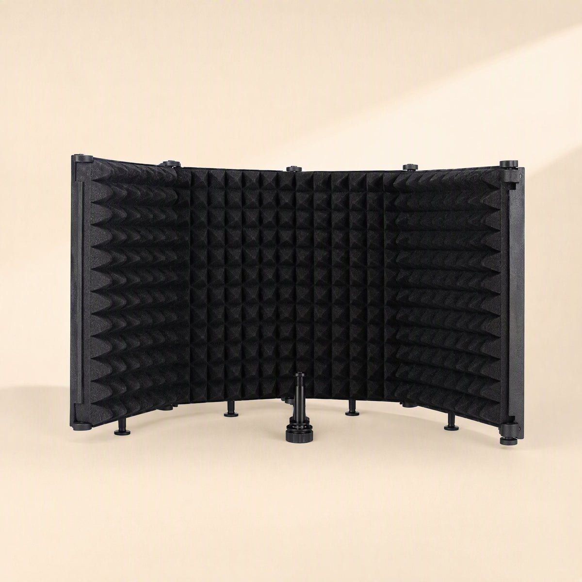 Soundcove – Front view of the three-panel foam shield opened in a curve with a microphone mount clip in the center