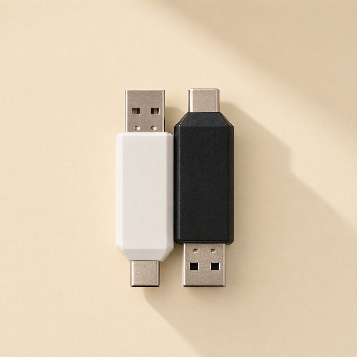 Slotbridge Type-C SD TF Card Reader in white and black, side by side with USB-A and USB-C plugs on cream