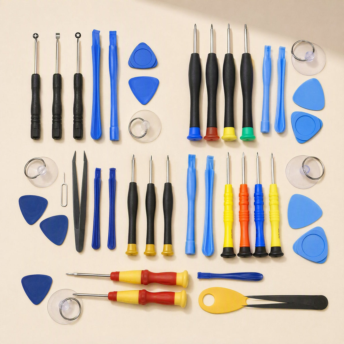 Bitfix Mobile Phone Repair Screwdriver Set with all tools laid out on a cream background