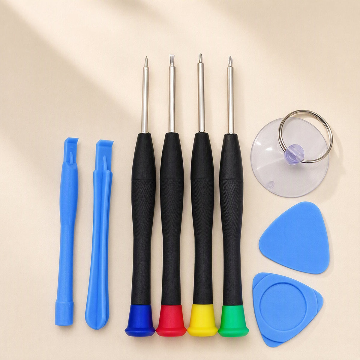 Bitfix – Four black-handled precision screwdrivers with colored end caps, two pry tools, picks and suction cup