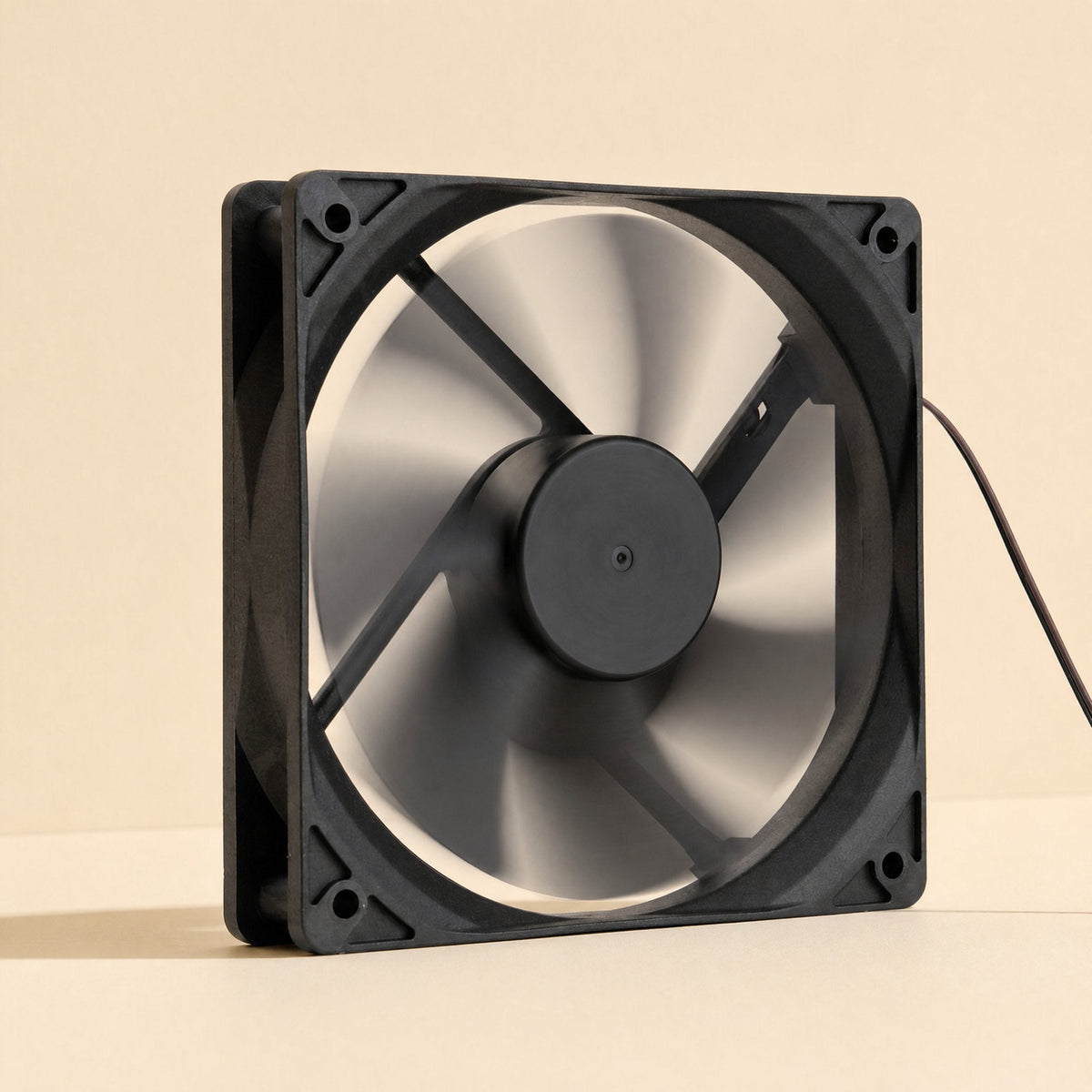 Breezeball 12cm Cooling Fan – angled side view showing the fan's depth, square frame, corner screw holes and central hub