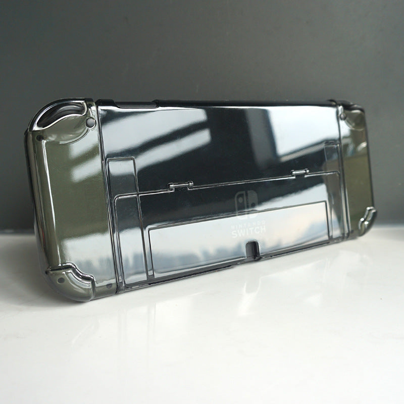 Frameclad – Back of a smoke-grey transparent case on a console, shown at an angle with the kickstand cutout visible
