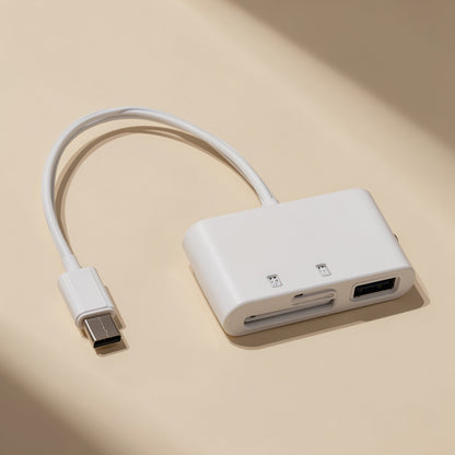 Typehub – White Type-C card reader with SD and TF slots and a USB port, shown at an angle with cable curled