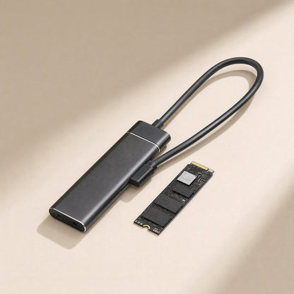 Alloydock M.2 SSD Enclosure – black enclosure with attached cable beside a bare M.2 SSD on a beige surface