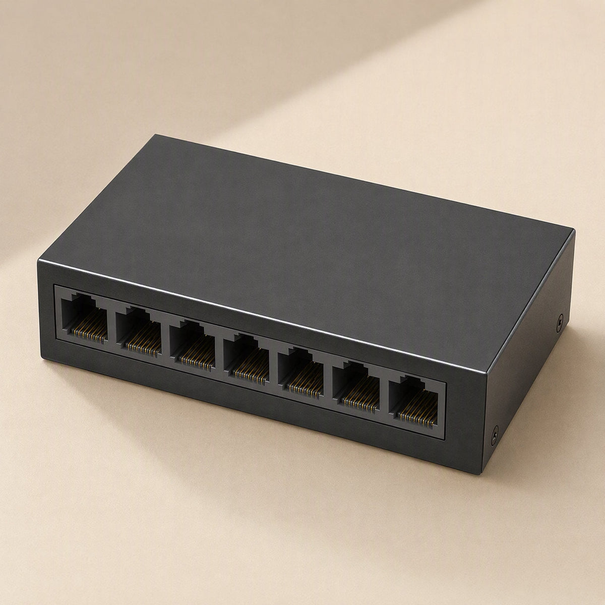 Deskport Desktop Network Switch – black metal network switch at a three-quarter angle showing a row of seven Ethernet ports