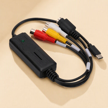 Streamport – Capture card cable from the right, with white cable labels, green LED and USB-C connector on the beige