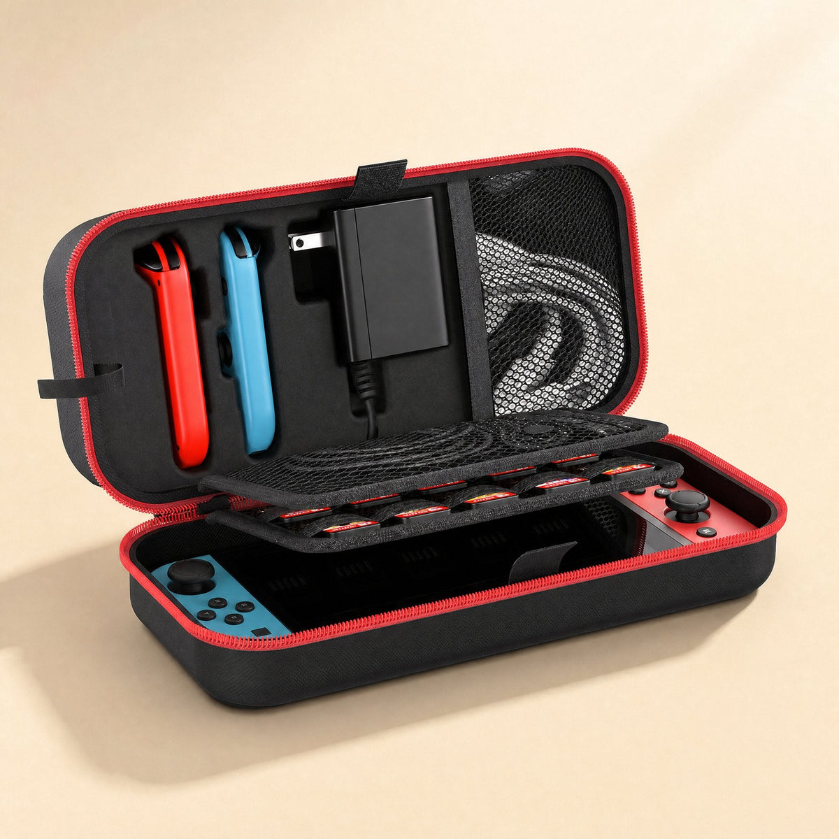 Switchnest – Open bag showing Joy-Con holders, charger, cable mesh pocket and game card tray above the console