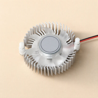 Cardcool – Top view of the silver finned heatsink with a clear seven-blade fan and white mounting pegs