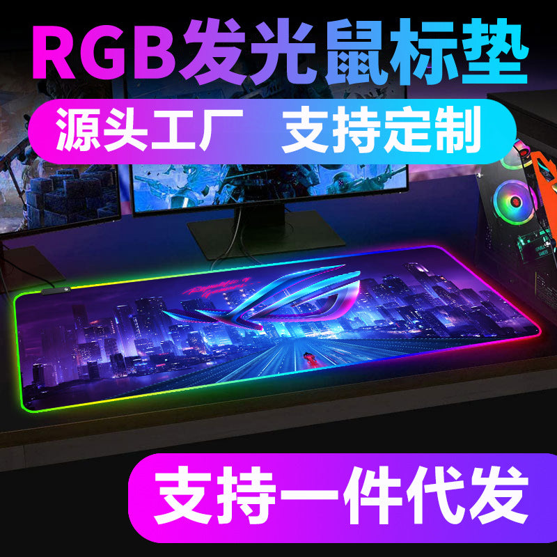 Lumospad RGB Luminous Extra Large Mouse Pad with purple neon cityscape and logo design on a gaming desk