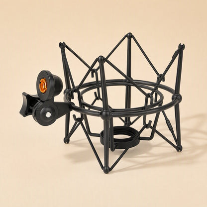 Metalhush – Black spider-style shock mount with orange-lined threaded stand mount, three-quarter view on a peach background