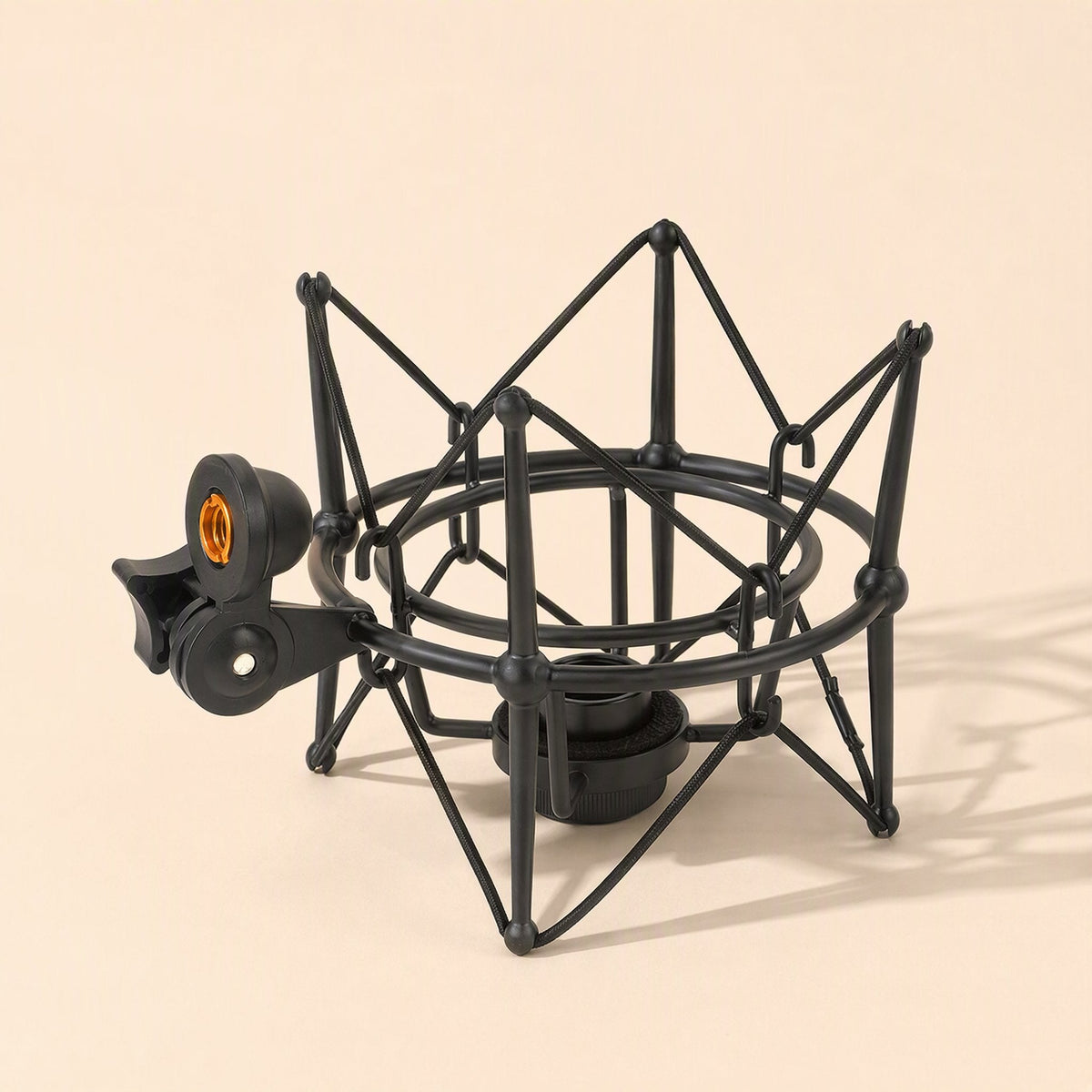 Metalhush – Black metal shock mount seen from a higher angle, showing the round cradle ring and elastic suspension