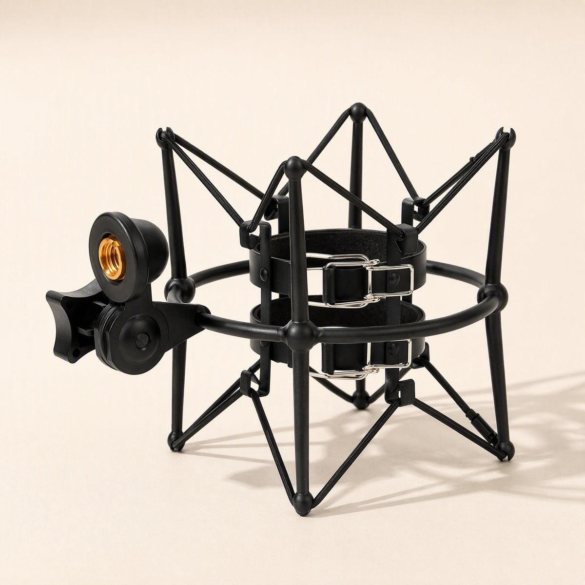 Metalhush – Black shock mount with two leather straps and silver buckles inside the ring, ready to hold a microphone