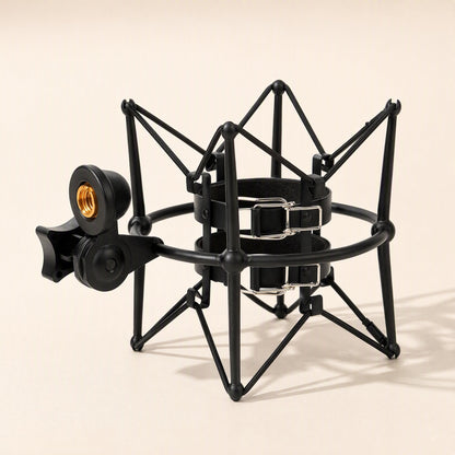 Metalhush – Black shock mount with two leather straps and silver buckles inside the ring, ready to hold a microphone