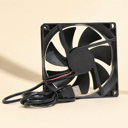 Coolbyte – Black 7-blade fan front view with red and black wires entering the frame and a USB plug on the coiled cable