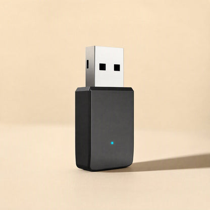 Bandbridge – Rear three-quarter view of the black USB network card with metal plug and blue indicator light