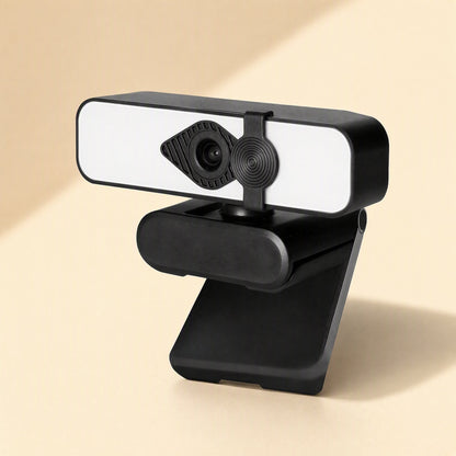 Camclarity USB Computer Camera, black webcam with white light panel, angled front view on a beige background